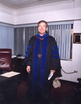 Man in graduation regalia